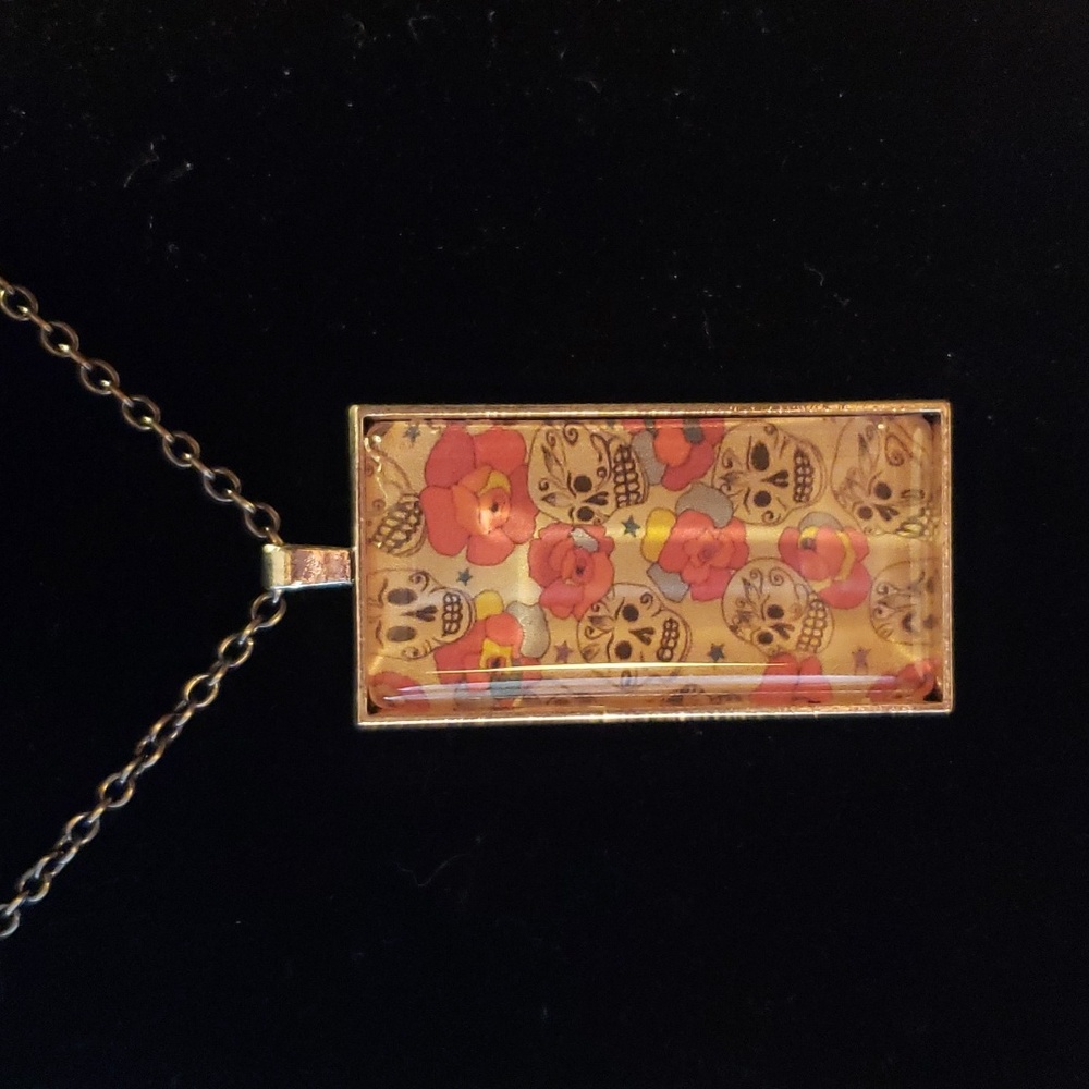 Handcrafted Skull and Flowers Pendent.
